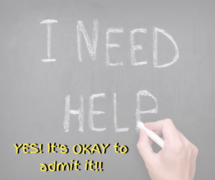 hand writing chalk message I need help