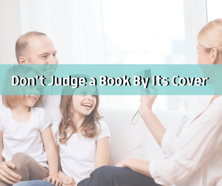 mom taking picture of family