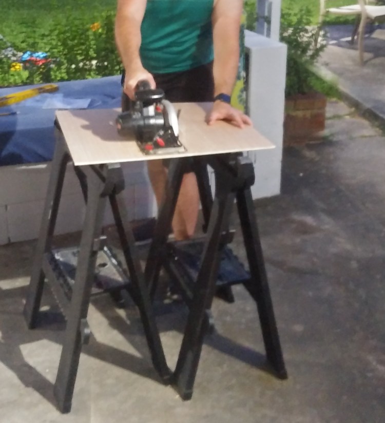 Cutting wood with a circular saw for DIY project