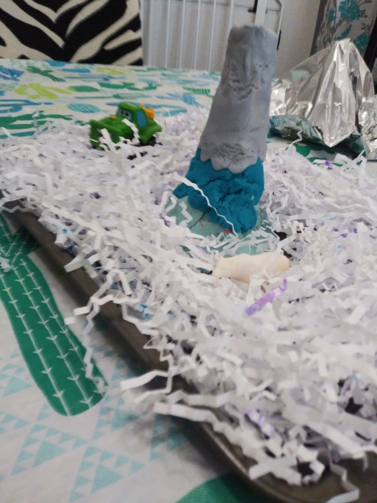 make an ice volcano with playdough